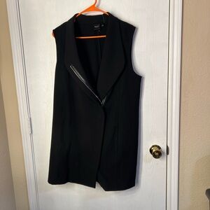 Black sleeveless zip front vest with faux leather zipper detail -